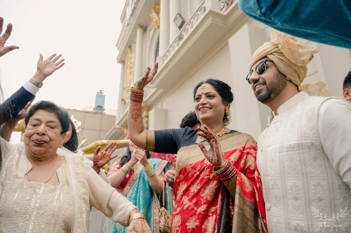 Family dancing during the baraat celebration